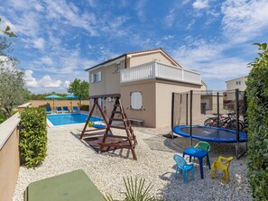 Water, Plant, Sky, Property, Cloud, Swimming Pool, Azure, Tree, Outdoor Furniture, Shade