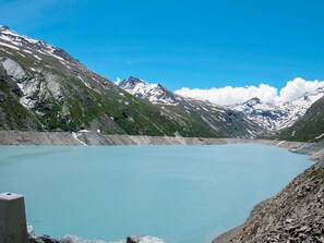Water, Sky, Mountain, Cloud, Water Resources, Natural Landscape, Lake, Highland, Body Of Water, Landscape