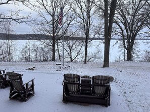 Patio in winter, frozen lake for ice fishing