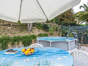 Pflanze, Eigentum, Azurblau, Schatten, Gartenmöbel, Regenschirm, Freizeit, Stuhl, Morgen, Tabelle