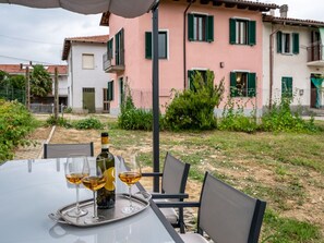 Plant, Building, Window, Property, House, Chair, Architecture, Yellow, Urban Design, Tree