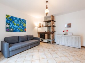 Furniture, Property, Comfort, Couch, Wood, Picture Frame, Interior Design, Living Room, Floor, Studio Couch