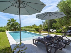 Water, Plant, Property, Sky, Furniture, Cloud, Swimming Pool, Umbrella, Azure, Shade