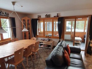 Furniture, Table, Window, Chair, Building, Wood, Curtain, Comfort, Lamp, Floor