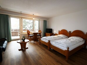 Furniture, Window, Building, Comfort, Wood, Curtain, Interior Design, Houseplant, Flooring