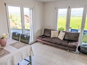 Furniture, Wood, Interior Design, Floor, Flooring, Couch, Room, Home, Chair, Living Room