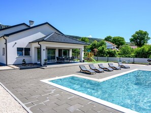 Building, Sky, Water, Property, Window, House, Outdoor Furniture, Swimming Pool, Urban Design, Tree