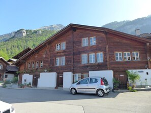 Wheel, Sky, Building, Car, Mountain, Property, Vehicle, Window, Motor Vehicle