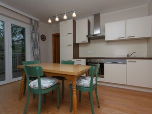 Furniture, Property, Countertop, Cabinetry, Sink, Wood, Table, Interior Design, Chair, Floor