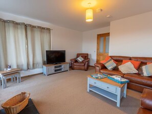 Furniture, Property, Table, Comfort, Lighting, Interior Design, Wood, Curtain, Living Room, Television