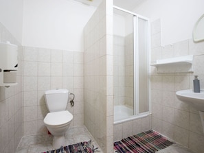 Building, Plumbing Fixture, Black, Bathroom, Purple, Flooring, Interior Design, Floor, Line