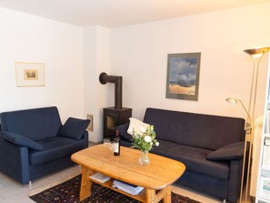 Furniture, Interior Design, Flooring, Couch, Floor, Wood, Living Room, Room, Picture Frame, Table