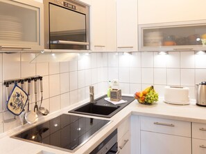 Kitchen Appliance, Kitchen, Countertop, Cabinetry, Major Appliance, Home Appliance, Kitchen Sink, Kitchen Stove, Interior Design, Stove