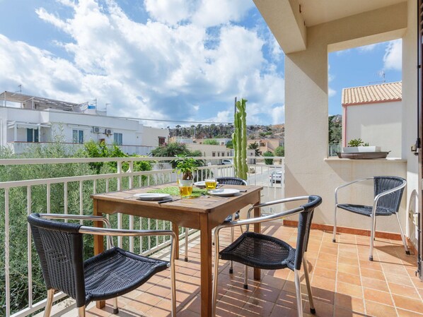 Cloud, Furniture, Sky, Table, Property, Chair, Building, Wood, Interior Design, Outdoor Furniture