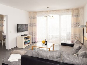 Furniture, Interior Design, Flooring, Couch, Floor, Wood, Living Room, Room, Ceiling, Apartment