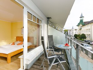 Furniture, Window, Building, Plant, Interior Design, Comfort, Table, Flowerpot, Wood, Floor