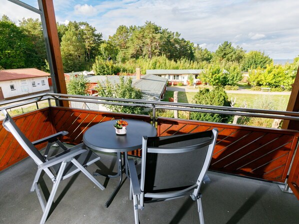 Sky, Table, Plant, Cloud, Furniture, Property, Building, Tree, Outdoor Table, Chair