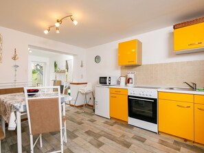 Cabinetry, Property, Furniture, Countertop, Sink, Building, Wood, Home Appliance, Kitchen, Lighting