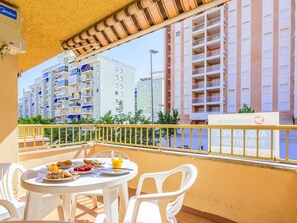 Flower, Plant, Furniture, Property, Window, Building, Green, Chair, Table, Sky