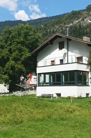 Cloud, Building, Plant, Sky, Window, Mountain, House, Tree, Land Lot, Grass