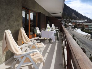 Property, Sky, Wood, Chair, Outdoor Furniture, Shade, Flooring, Real Estate, Table, Cloud