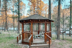 Beautiful gazebo in the backyard makes for a romantic getaway or lounging while your here!