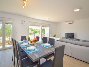 Sky, Plant, Furniture, Plant Community, Table, Natural Landscape, Chair, Land Lot, Outdoor Furniture, Tree