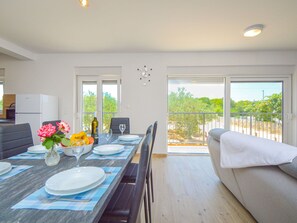 Sky, Plant, Furniture, Plant Community, Table, Natural Landscape, Chair, Land Lot, Outdoor Furniture, Tree