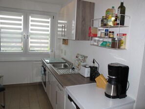 Property, Cabinetry, Kitchen Sink, Window, Countertop, Kitchen Appliance, Sink, Kitchen Stove, Interior Design, Kitchen