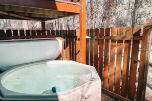 Escape to tranquility in our rejuvenating hot tub oasis. Welcome relaxation awaits!