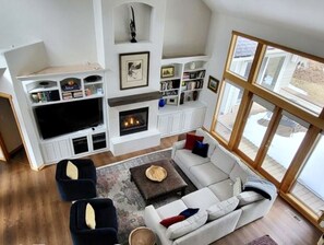 view of living room from upstairs landing