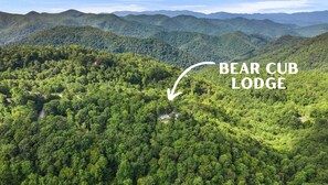 Elevate your getaway to new heights with a bird’s eye view of Bear Cub Lodge. From above, marvel at the charm and allure of the Smoky Mountains that make our secluded retreat a true haven for relaxation.