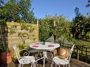 Table, Plant, Furniture, Property, Sky, Chair, Outdoor Table, Botany, Interior Design, Outdoor Furniture
