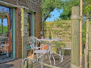 Furniture, Plant, Building, Chair, Table, Wood, Outdoor Table, Shade, Outdoor Furniture, Tree