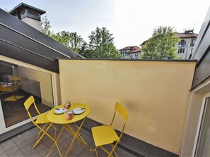 Sky, Furniture, Table, Building, Window, Chair, Shade, Tree, Wood, Yellow