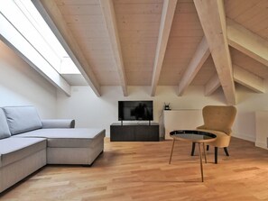Wood, Comfort, Architecture, Flooring, Couch, Interior Design, Living Room, Floor, Laminate Flooring, Wall