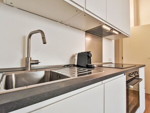 Kitchen Sink, Tap, Sink, Countertop, Cabinetry, Kitchen, Plumbing Fixture, Interior Design, Wood, Kitchen Stove