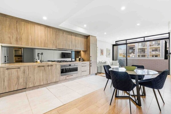 Living area, with large open kitchen