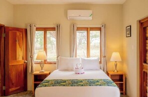 Luxury bedroom with walk out to pool