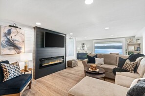Beautifully remodeled fireplace for cozy evenings.