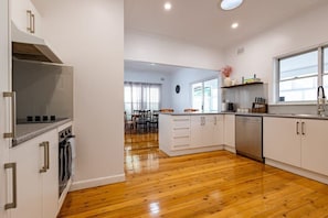 Kitchen + Coffee Machine + Breakfast Bar & Seats