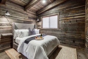 Our charming bathroom retreat! Bathed in soft light from the warm yellow curtain, this tranquil space invites you to unwind and rejuvenate. A spacious vanity with a large mirror provides ample room for grooming!