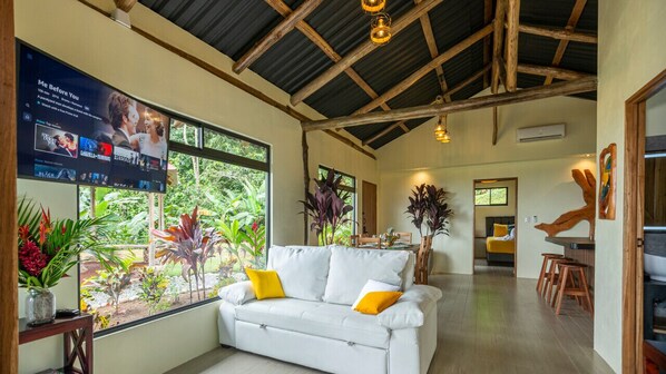 Inviting space for family time with vaulted ceiling.