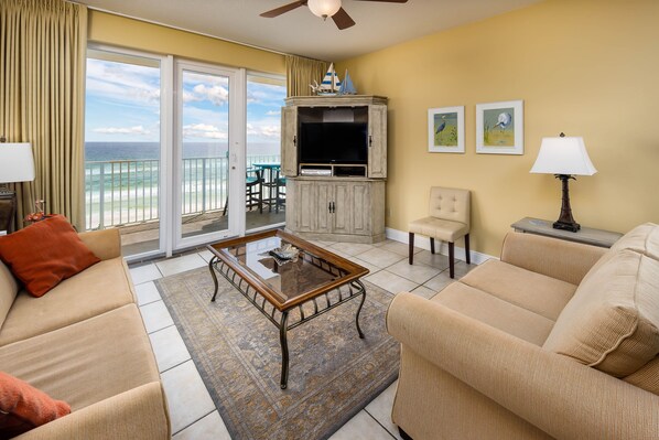 The living room is very comfortable with amazing views! - Super comfy furniture featured in the living room.