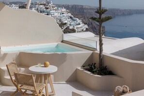 Private balcony with partial sea view and hot tub