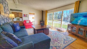The living room is a wonderful place to gather. Pull out couch here for thekids