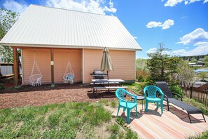 Backyard space with areas to lounge and soak in the mountain views!