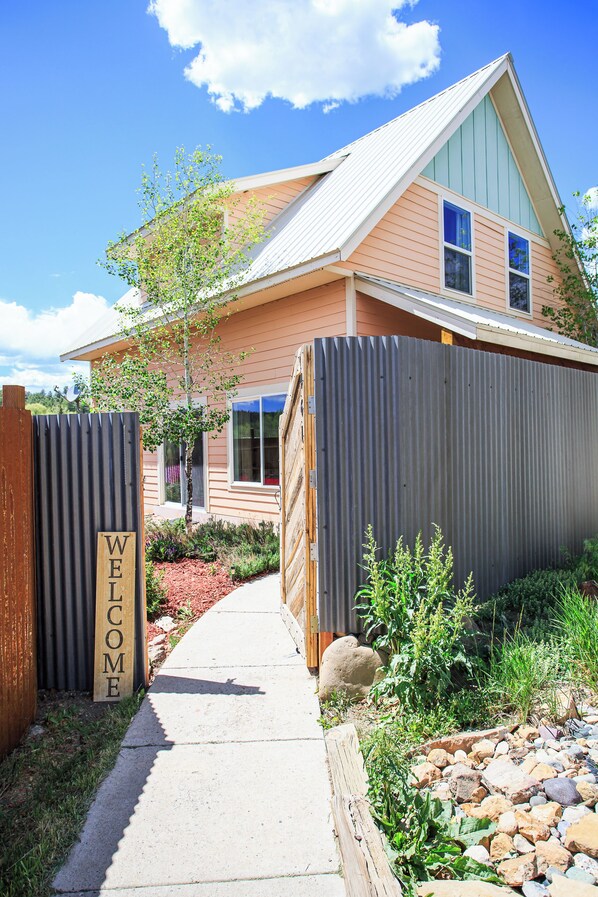 Hilltop Haus, featuring a beautiful privacy fence.