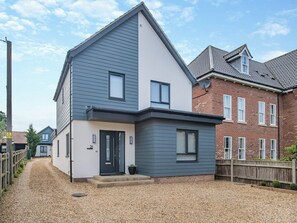 Exterior. Entrance to the flat | Hollyhocks- The Loft at The Gatehouse - Hollyhocks, Holt