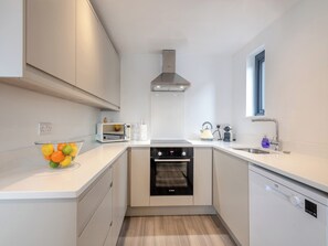 Kitchen | Hollyhocks- The Loft at The Gatehouse - Hollyhocks, Holt